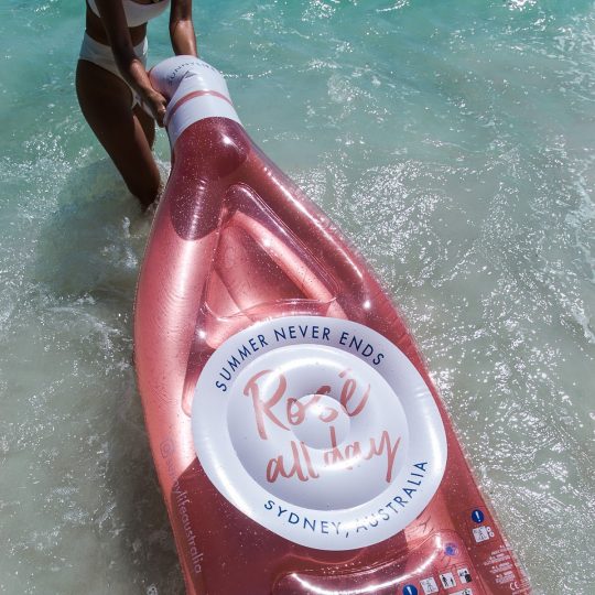 ROSE BOTTLE LEAF LUXE LIE-ON FLOAT