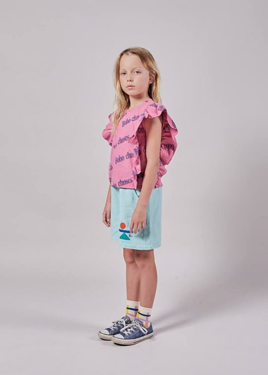 BOBO RETRO ALL OVERRUFFLE WOVEN TOP