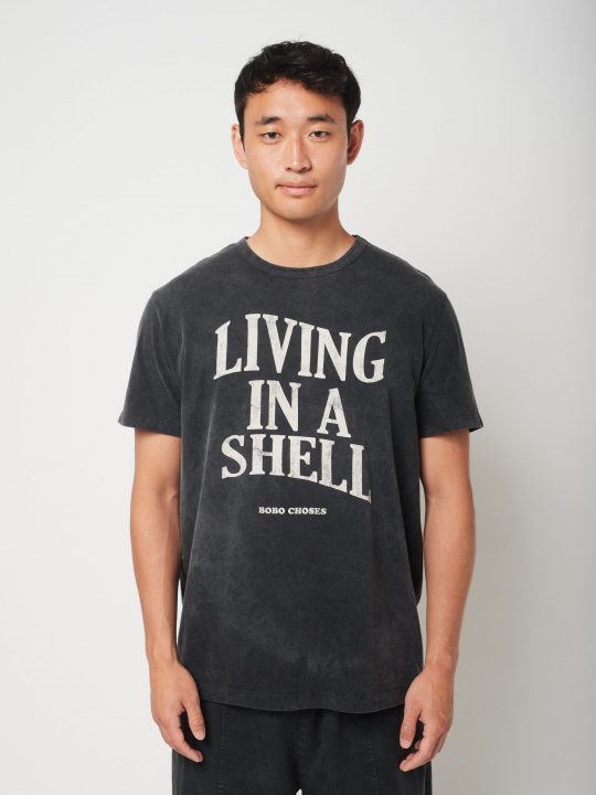 LIVING IN A SHELL UNISEX T-SHIRT